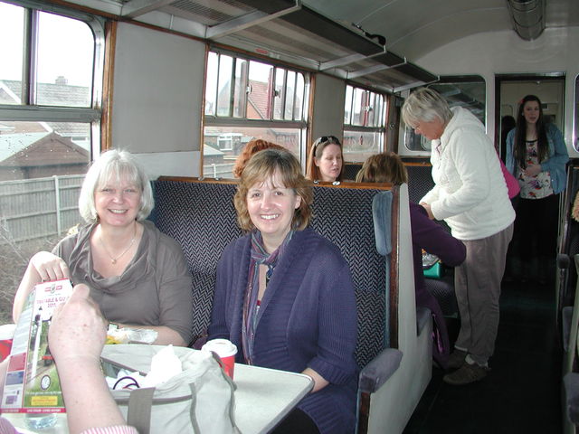 Friends and colleagues of Chris Fisher on board the steam coach from Sheringham to Holt
