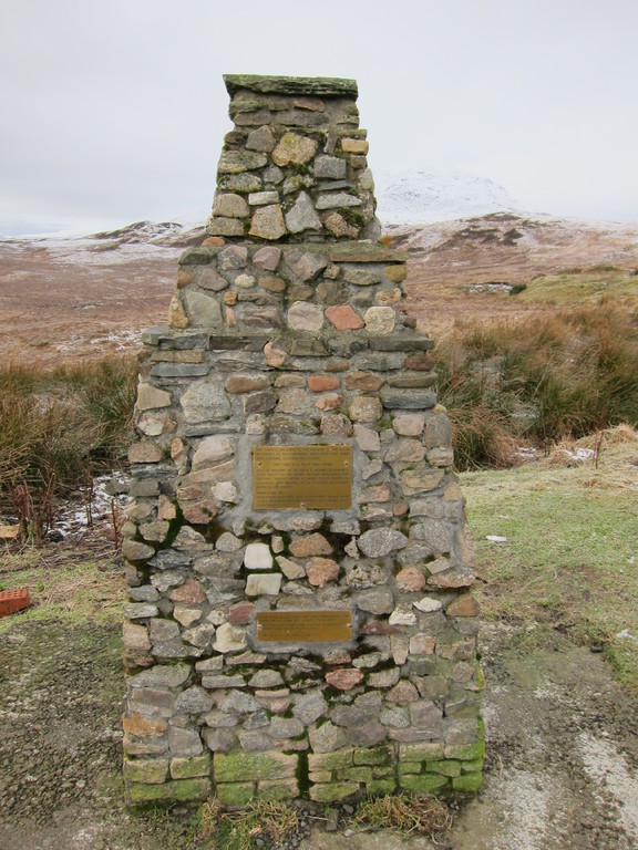 Black Mount Estate, this cairn was dedicated to Hugh Munro who catalogued the Scottish peaks over 3000 feet (known as the Munros). This cairn was built with stones taken from the peaks of the Munros by climbers
