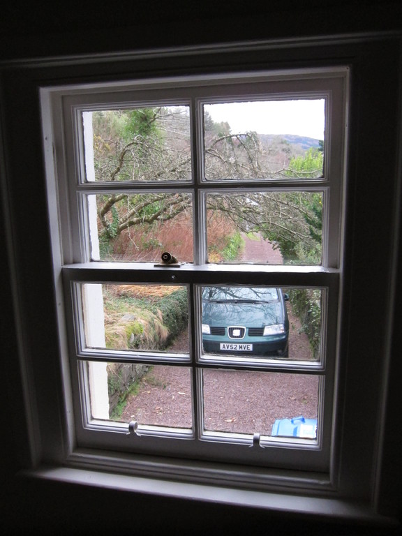 Our car parked in the long narrow stonewall lined drive of Craggan Cottage off Glaick road
