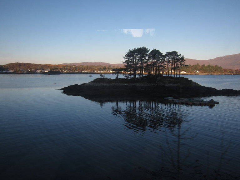 In the distance is the fishing village of Plockton with Loch Carron in the foreground
